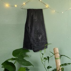 Black distressed skinny jeans